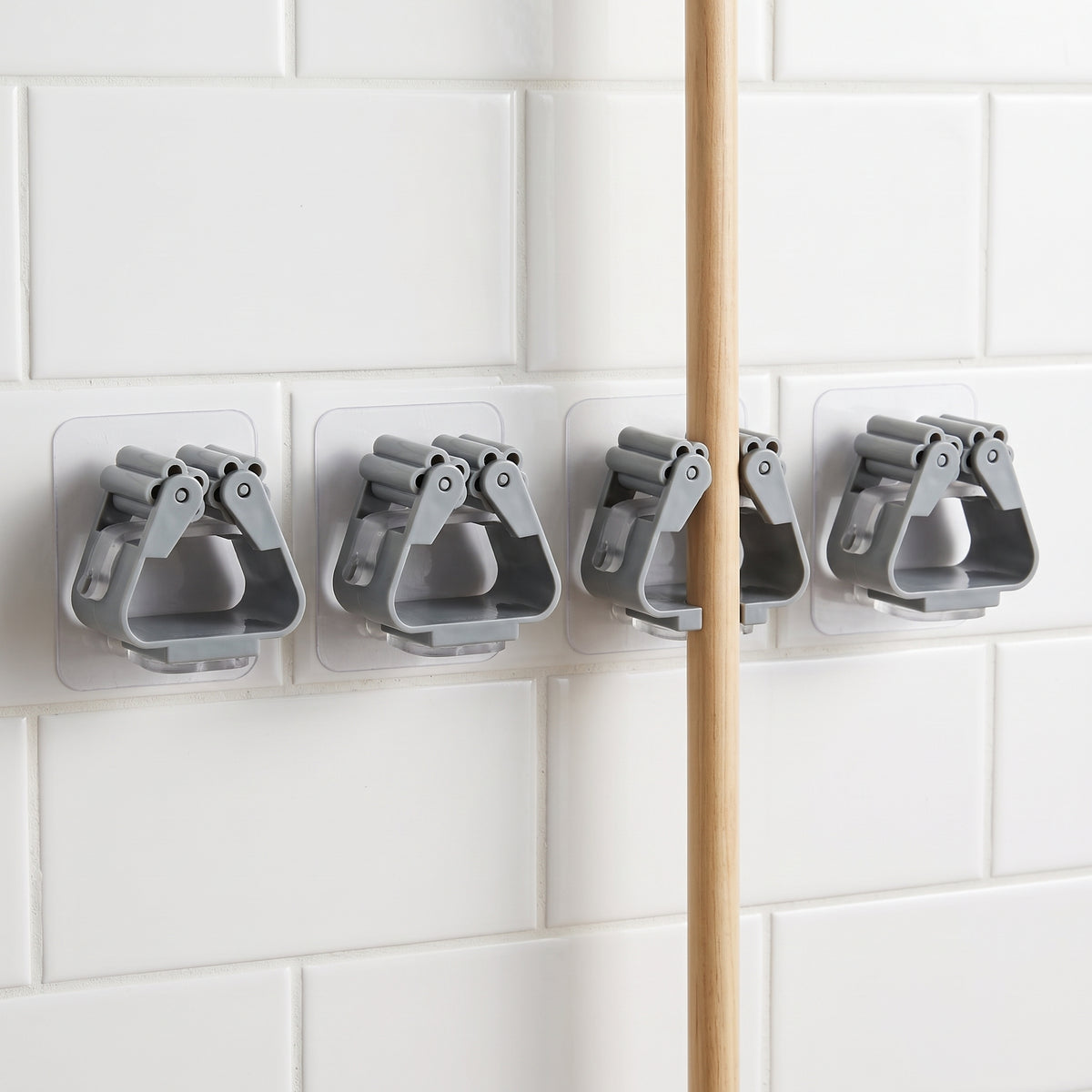 Wall-Mounted Mop and Broom Holder with Strong Adhesive Hooks for Bathroom and Kitchen Organization