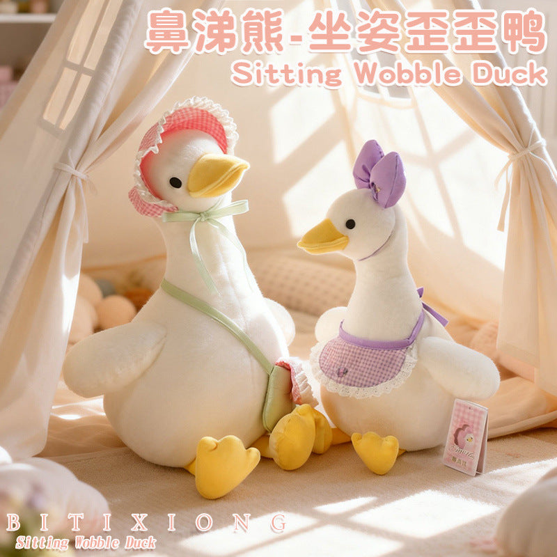 Sitting Duck Plush Toy with Bib and Backpack Options