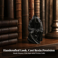 Compact Hooded Figure Sculpture