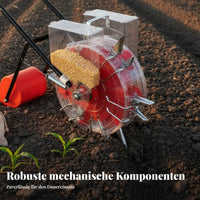 Hand-push seeder sows and fertilizes soybeans.