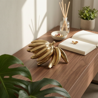 Metal Banana decor Golden Finish-Toned Banana Sculpture Shiny Tabletop Ornament for Coffee Table, Desk, Reading Corner