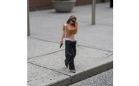 Hand-Painted Resin Figurine Dark Pants Walking Woman Figurine Phone Accessory