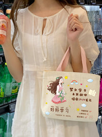 帆布包女2025新款可爱简约饭盒袋可爱小布袋包包上班小拎包便当包