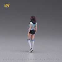 VM 1/64 Scale Soccer Baby Miniature Figure in Blue and White Striped Jersey Holding Football