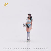 VM 1/64 Scale Soccer Baby Miniature Figure in Blue and White Striped Jersey Holding Football