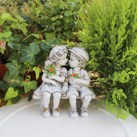 Boy and Girl on Bench Figurine Artisan-Crafted Look Resin Couple Ornament