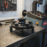 Universal Wheel Stabilizer Clamp Balances Centerless Wheels for Auto Repair Shop