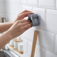 Wall-Mounted Mop and Broom Holder with Strong Adhesive Hooks for Bathroom and Kitchen Organization