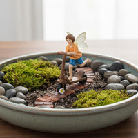 Scooter Riding Fairy Boy Statue Hand-Painted Garden Decoration for Patio