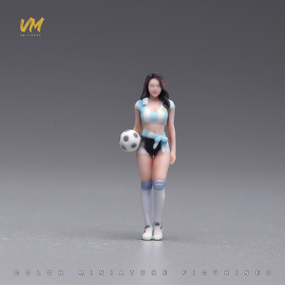 VM 1/64 Scale Soccer Baby Miniature Figure in Blue and White Striped Jersey Holding Football