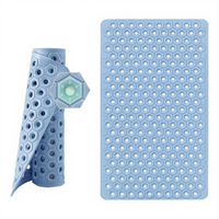 Non-slip TPE shower mat drains fast.