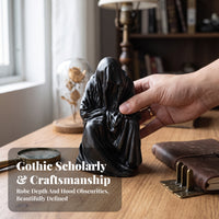 Compact Hooded Figure Sculpture