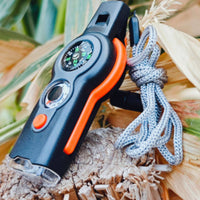 Reflective Mirror 7-in-1 Survival Whistle High-Loudness Whistle Compass Thermometer Tool Lanyard Included Outdoor Gear Storage Compartment for Camping