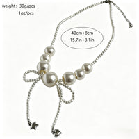 Oversized Faux Pearl Bow Necklace with Tassel