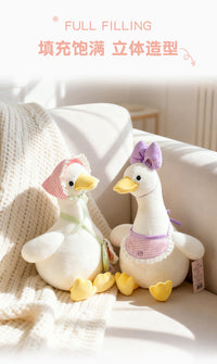 Sitting Duck Plush Toy with Bib and Backpack Options