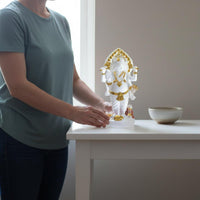 Ornate Headdress Elephant-Headed Deity Figurine Layered Draped Clothing Standing Deity Statue Gold-Toned Four-Armed Figurine Three-Dimensional for Shelf Display