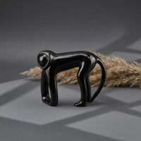 Abstract Monkey Sculpture Glossy Black Resin Monkey Figurine Hollowed Front