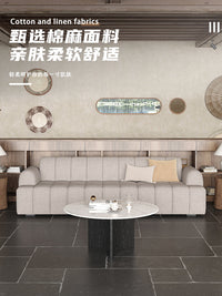 侘寂风民宿大厅休息区服装店会客区客厅接待直排泡芙棉麻布艺沙发