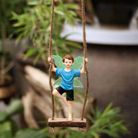 Swinging Boy Fairy Figurine Weather Resistant Resin Boy Fairy on a Swing Handcrafted Look Glow in the Dark Ornament for Gardeners, Balcony