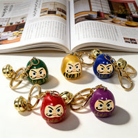 Japanese Daruma Doll Keychain with Bell, Resin Lucky Charm for Bags and Keys