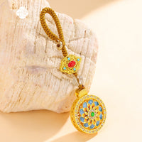 Auspicious Eight Treasures Compass Keychain with Rhinestone Embellishment, Rotating Design, and Safety Buckle