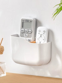 Wall-Mounted Remote Control and Phone Holder with Charging Port
