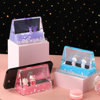 Creative Quicksand Liquid Flowing Phone Stand with Cartoon Figurine Ornament