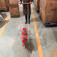 Hand-Pushed Roller Seeder for Small Grains and Vegetables