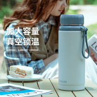Large Capacity Stainless Steel Insulated Water Bottle with Tea Infuser and Portable Handle for Travel and Home