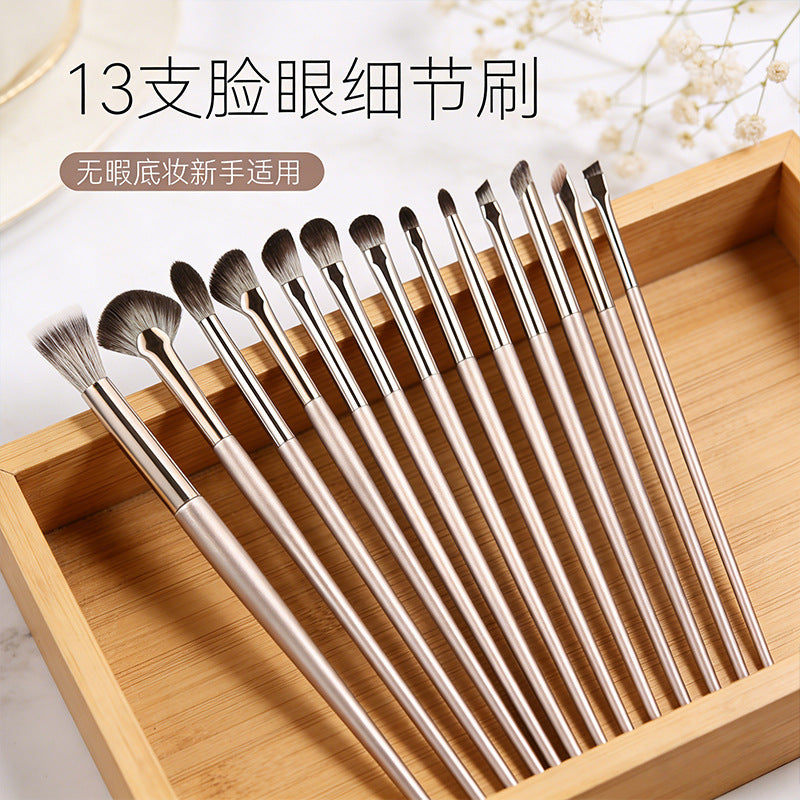 15-Piece Gilded Makeup Brush Set with Soft Bristles and Storage Bag