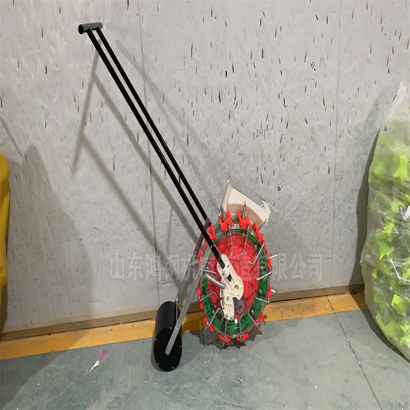 Hand-Pushed Roller Seeder for Small Grains and Vegetables
