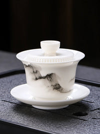 Mutton Fat Jade Porcelain 360° Rotating Gaiwan Tea Bowl with Integrated Filter