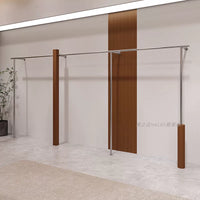 Stainless Steel Wall-Mounted Garment Rack with Walnut Finish for Retail Display