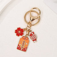 Japanese Omamori Koi Fish Keychain with Cherry Blossom Charm for Good Luck and Wealth