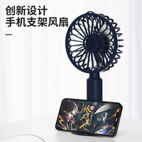 2024 Portable USB Rechargeable Mini Handheld Fan with Phone Holder for Office and Students