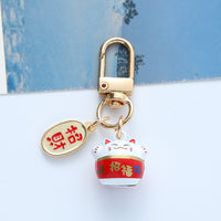 Japanese Lucky Cat Keychain Charm with Hollow Bell for Bags and Accessories