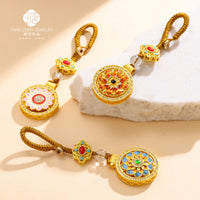 Auspicious Eight Treasures Compass Keychain with Rhinestone Embellishment, Rotating Design, and Safety Buckle
