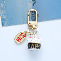 Japanese Lucky Cat Keychain Charm with Hollow Bell for Bags and Accessories