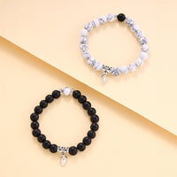 Couple's Frosted Glass Bead Bracelet Set with Crown Charm