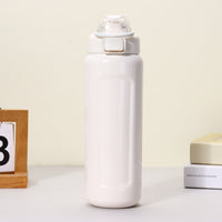 Large Capacity Stainless Steel Insulated Water Bottle with Handle and Pop-up Lid for Outdoor Travel and Hiking