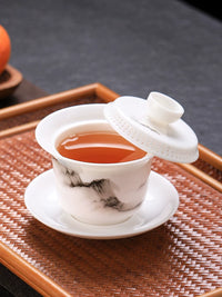 Mutton Fat Jade Porcelain 360° Rotating Gaiwan Tea Bowl with Integrated Filter
