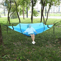 Portable Outdoor Double Hammock with Sunshade, Anti-Roll, Quick Setup for Camping and Relaxation
