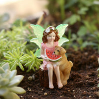 Fairy Eating Watermelon Ornament Whimsical Design Mystical Maiden and Canine Statue Glow in the Dark for Gardeners