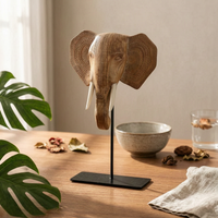 Elephant Head Sculpture Patterned Ears Elephant Statue Visible Tusks