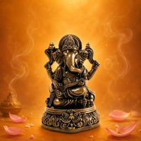 Elephant Deity Figurine Raised Scrollwork Seated Elephant Statue