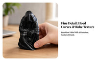 Compact Hooded Figure Sculpture