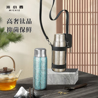 Pure Titanium Insulated Bottle with Tea Infuser for Home and Outdoor Use