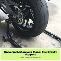 Steel stand lifts motorcycle wheels.