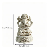 Elephant Deity Figurine Raised Scrollwork Seated Elephant Statue