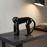 Abstract Monkey Sculpture Glossy Black Resin Monkey Figurine Hollowed Front
